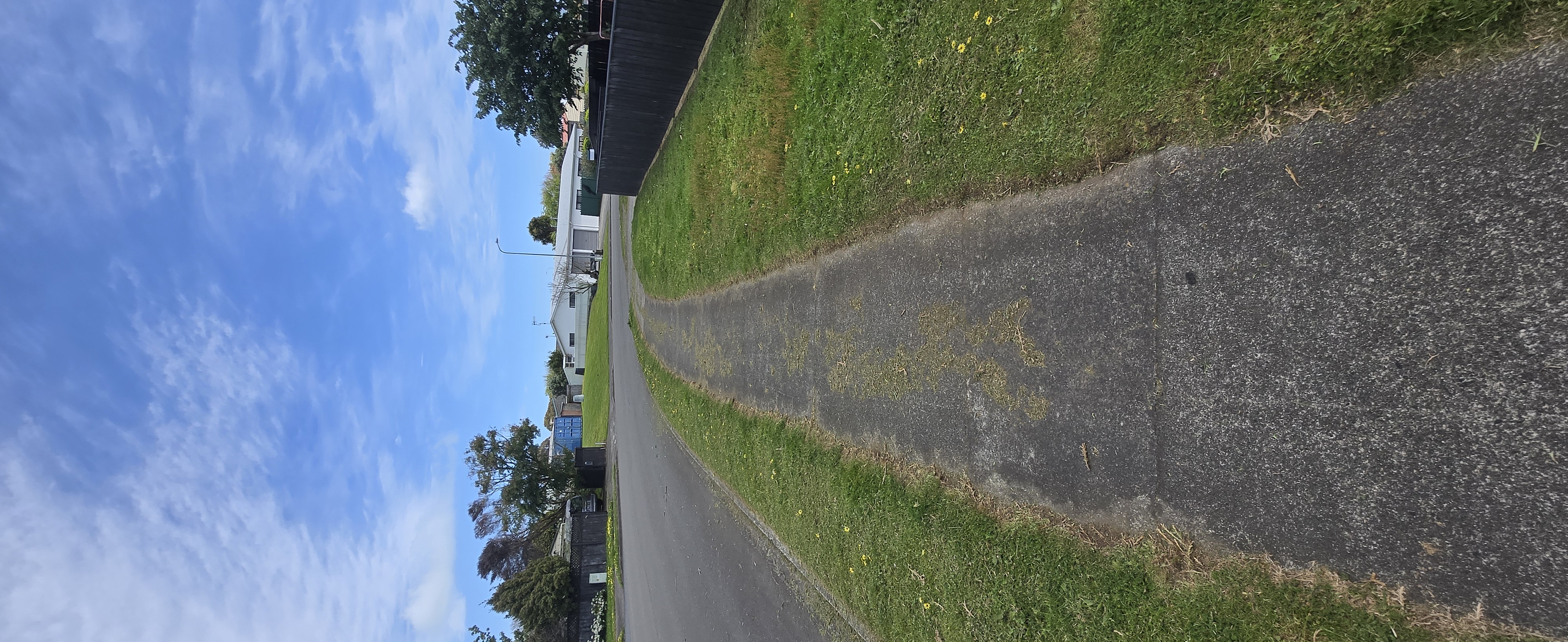 Clean edged pathway after lawn mowing